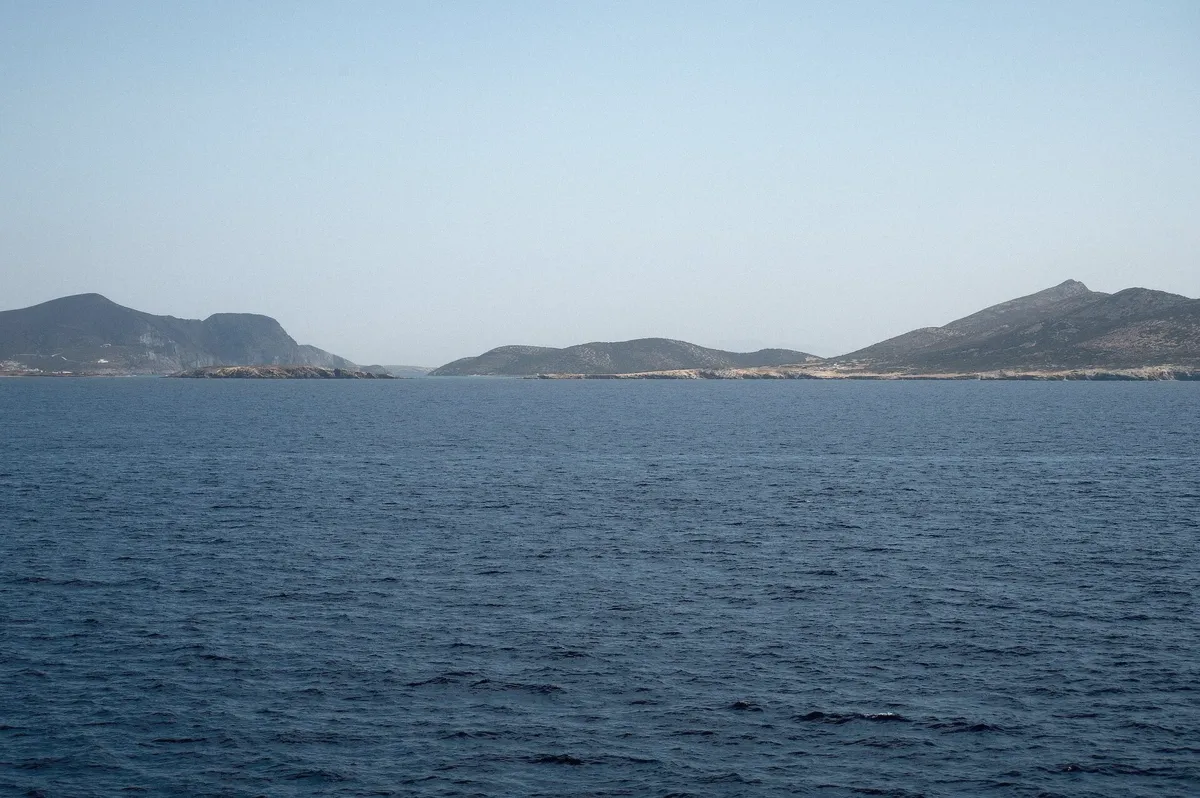 Tsimintiri islet and Despotiko seen between Paros and Antiparos
