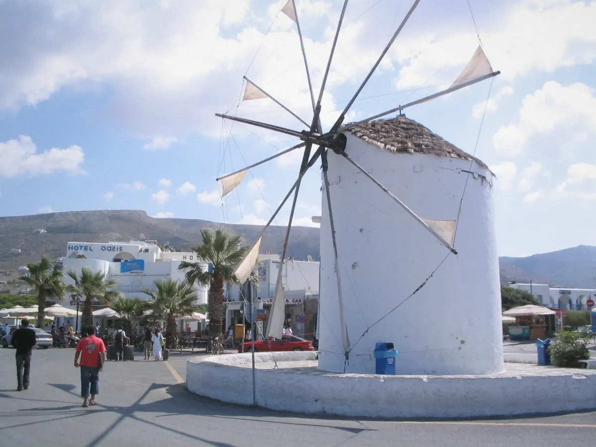 Traditional windmill on the coast of Paros above the boat routes